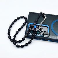 Koyu Mavi Renkte Sıkma Ateş Kehribar Tesbih