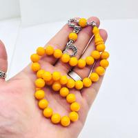 Koyu Sarı Renkte Misket Kesim Sıkma Ateş Kehribar Tesbih