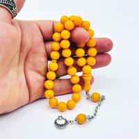 Koyu Sarı Renkte Misket Kesim Sıkma Ateş Kehribar Tesbih