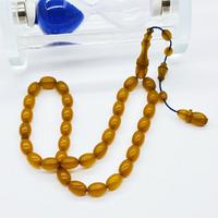 Koyu Sarı Renkte Sıkma Ateş Kehribar Tesbih