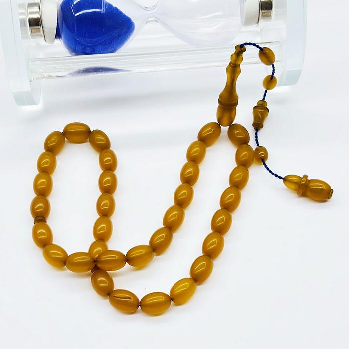 Koyu Sarı Renkte Sıkma Ateş Kehribar Tesbih