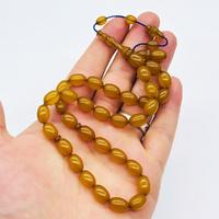 Koyu Sarı Renkte Sıkma Ateş Kehribar Tesbih