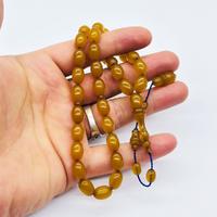 Koyu Sarı Renkte Sıkma Ateş Kehribar Tesbih