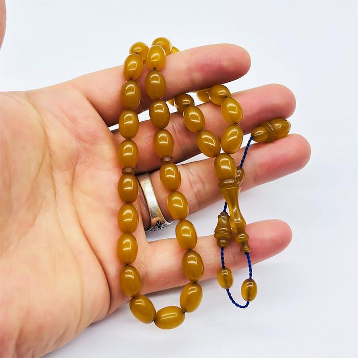 Koyu Sarı Renkte Sıkma Ateş Kehribar Tesbih