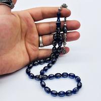 Mavi Renkte 925 Ayar Gümüş İşlemeli Sıkma Ateş Kehribar Tesbih