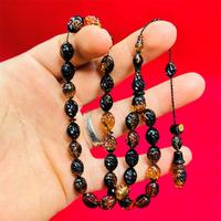 Nakkaş Oyma İşçilikli Sıkma Ateş Kehribar Tesbih