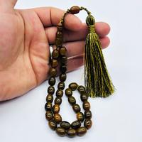 Saçak Püsküllü Koyu Yeşil Renkte Sıkma Ateş Kehribar Tesbih