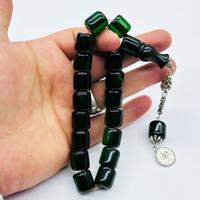 Şeffaf Koyu Yeşil Renkte Efe Maskot Sıkma Ateş Kehribar Tesbih