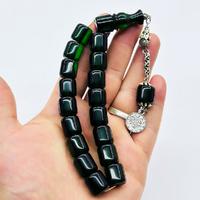 Şeffaf Koyu Yeşil Renkte Efe Maskot Sıkma Ateş Kehribar Tesbih