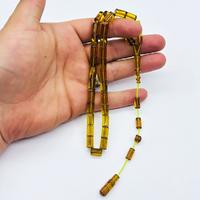 Şeffaf Sarı Renkte Kesme Model Sıkma Ateş Kehribar Tesbih