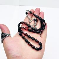 Turuncu Siyah Hareli Sıkma Ateş Kehribar Tesbih